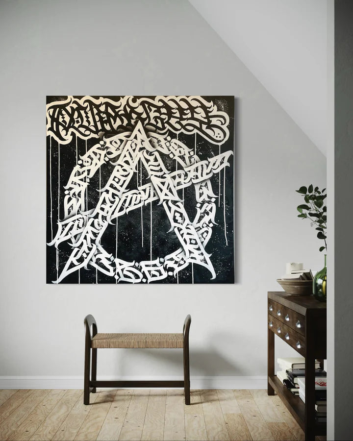 Anarchy calligraffiti canvas by Burnzy Art displayed on a wall, highlighting its raw energy and contemporary presence in an interior space.
