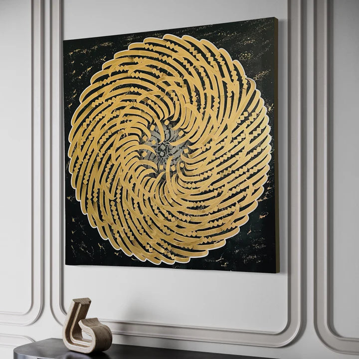 PRECIOUS METAL "GOLD" mounted on the wall – highlighting the elegant glow of liquid gold calligraphy in a contemporary display setting.