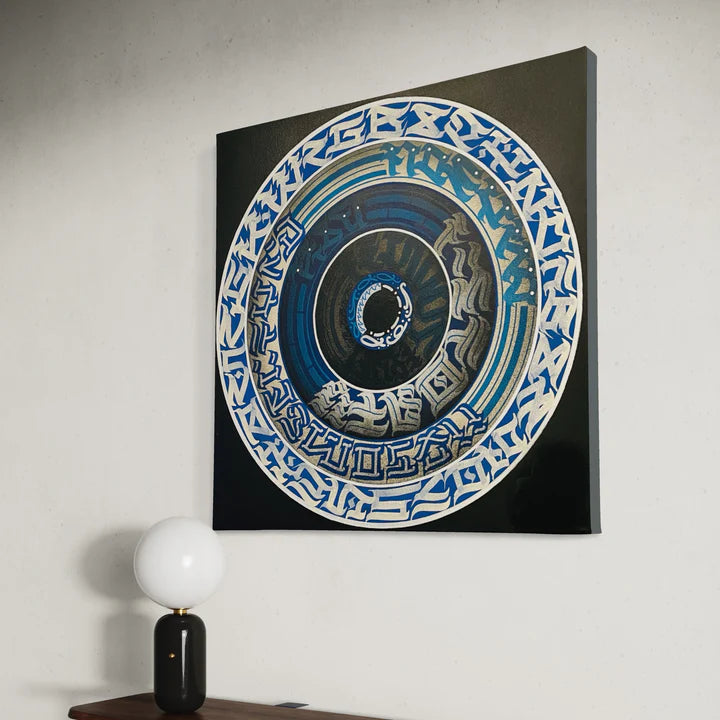THE CALLI DISK mounted on a wall – bold circular calligraphy art in blue and white creating a serene and sophisticated presence.