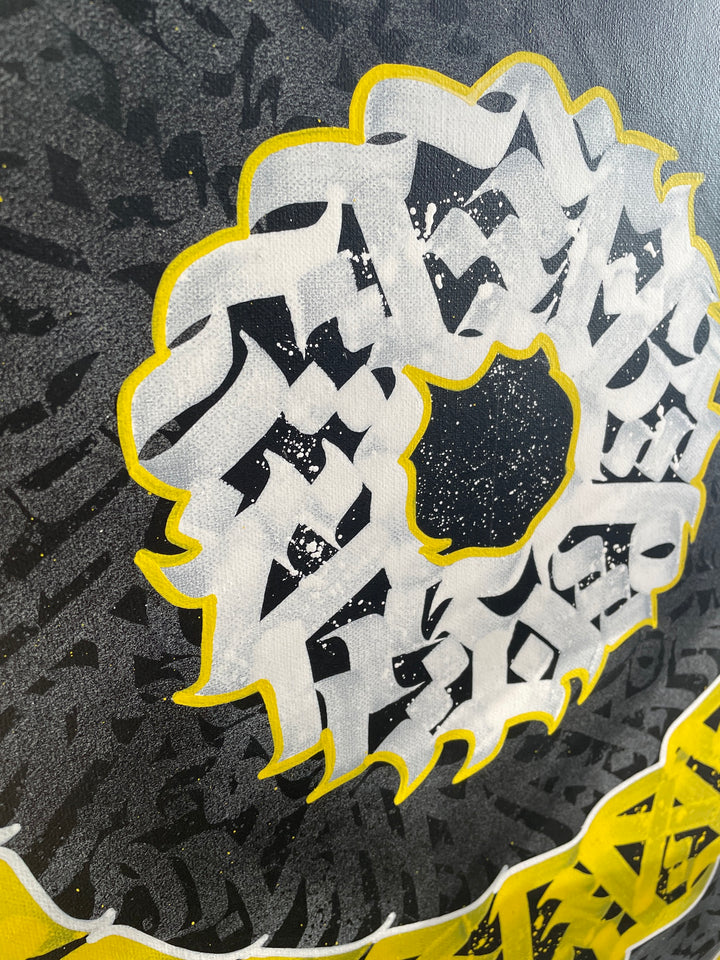 Close-up view of the center of “THE LUMINOUS CALLIGRAM” – focusing on the detailed yellow brushwork and symbolic spiral formation.