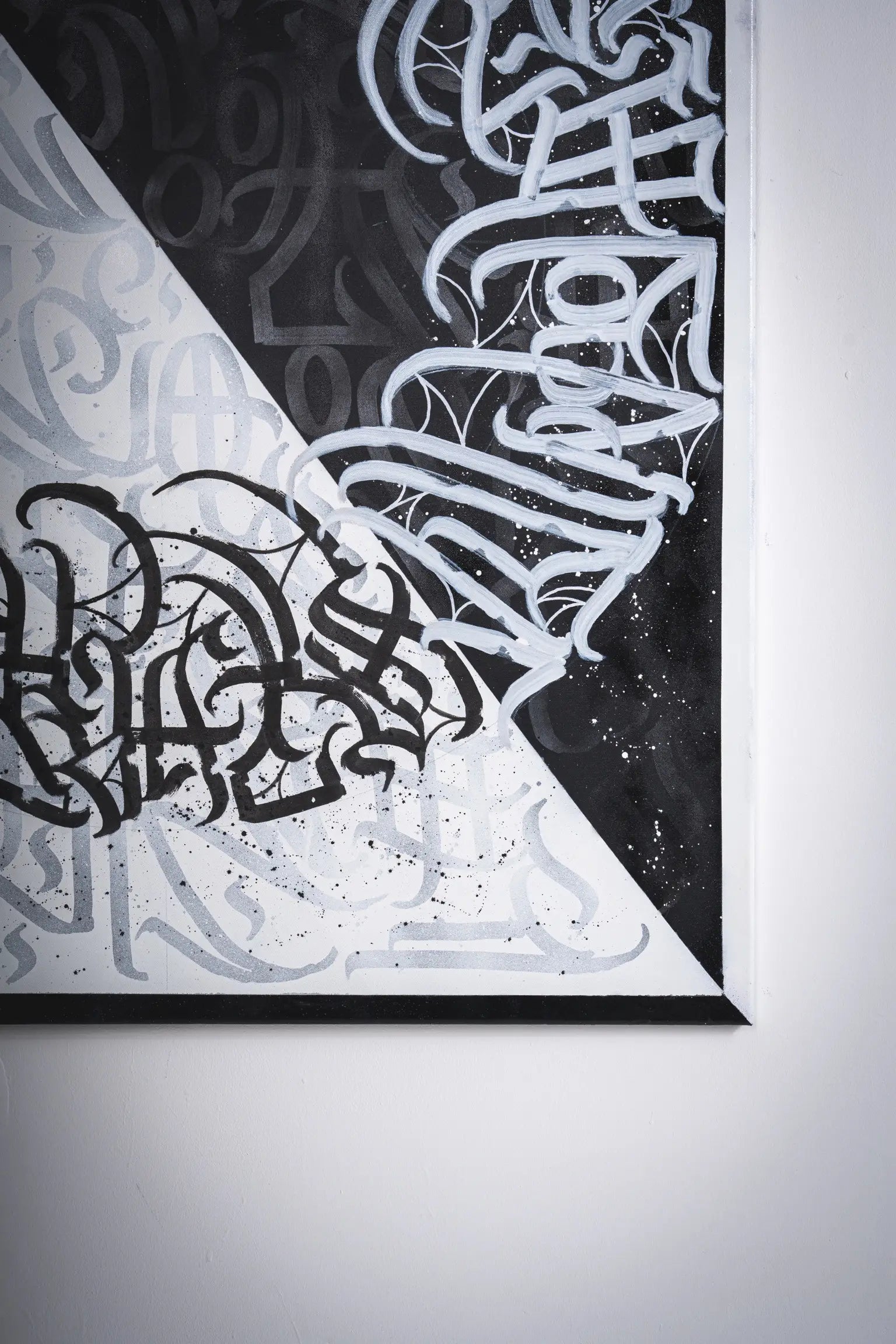 Bottom right side view of THE YIN-YANG – emphasizing canvas depth, contrast between dark and light sections, and the craftsmanship of Burnzy Art’s brush calligraphy.
