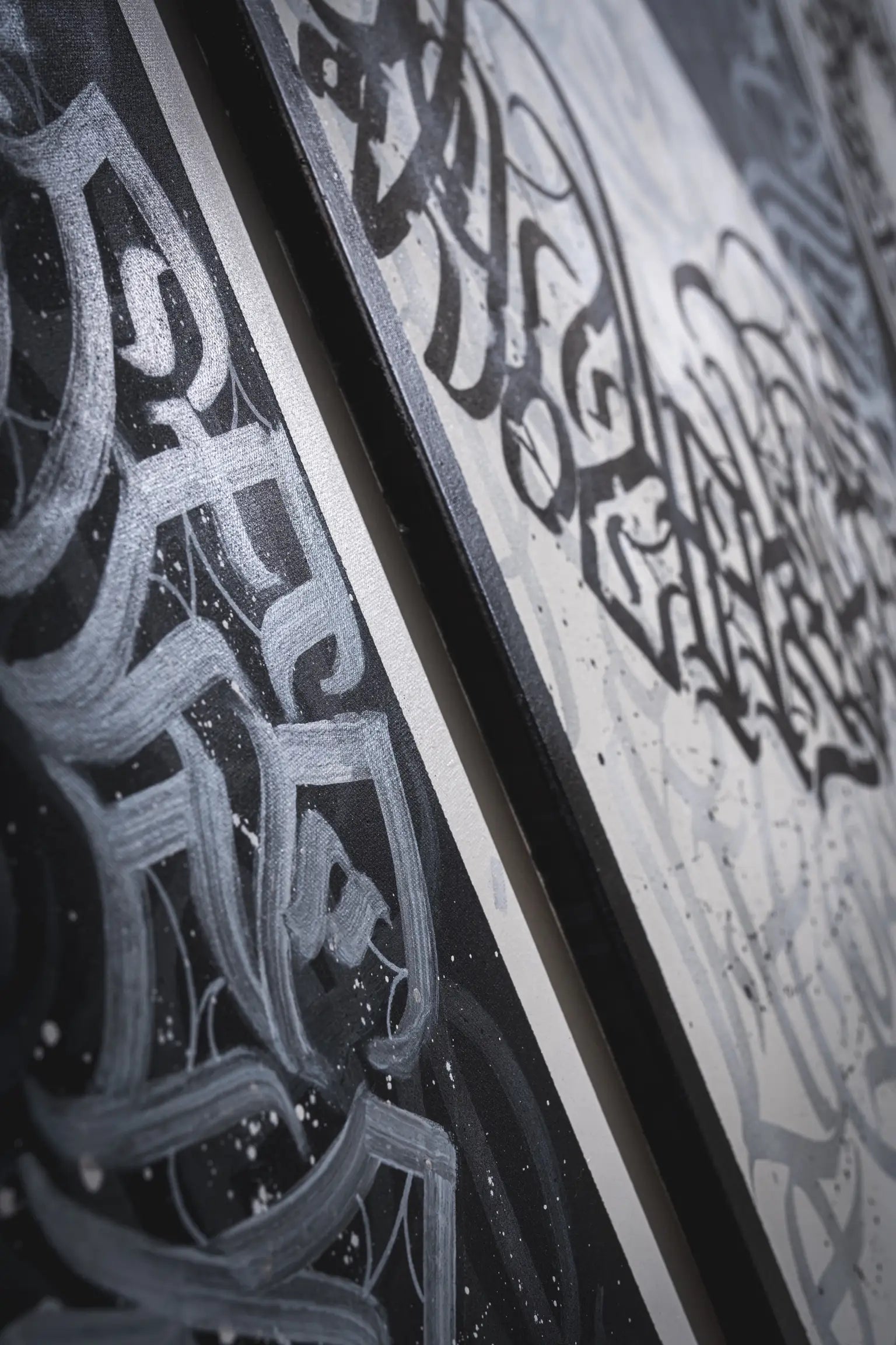 Right side angled view of THE YIN-YANG – highlighting the flow of brush strokes and the visual rhythm created across the three calligraffiti panels.