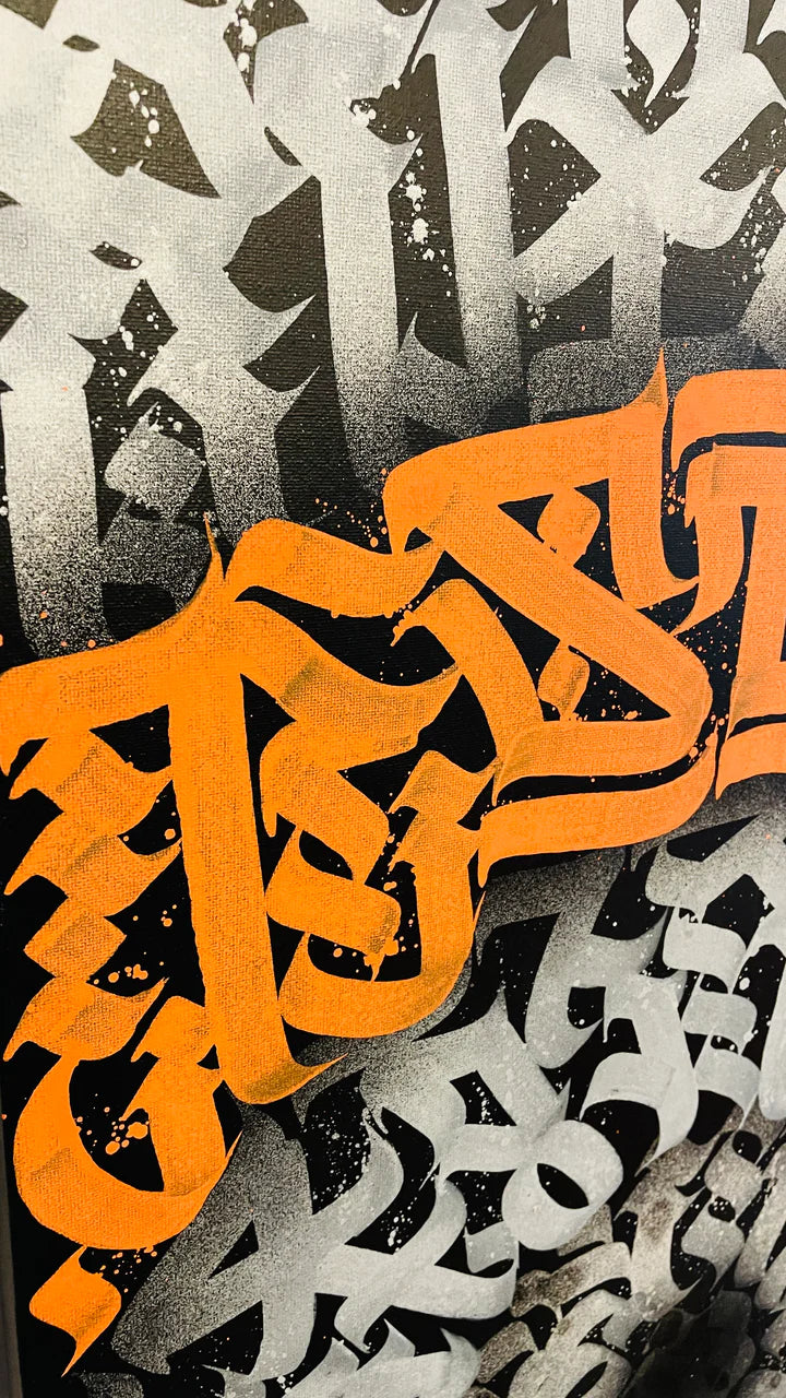 Top left angled view of the amber canvas, displaying intricate paint layering and vibrant orange tones.