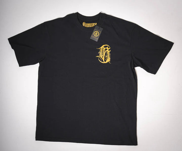 Full flat view of the front side of the black shirt showing the centered calligraphy logo in detail.