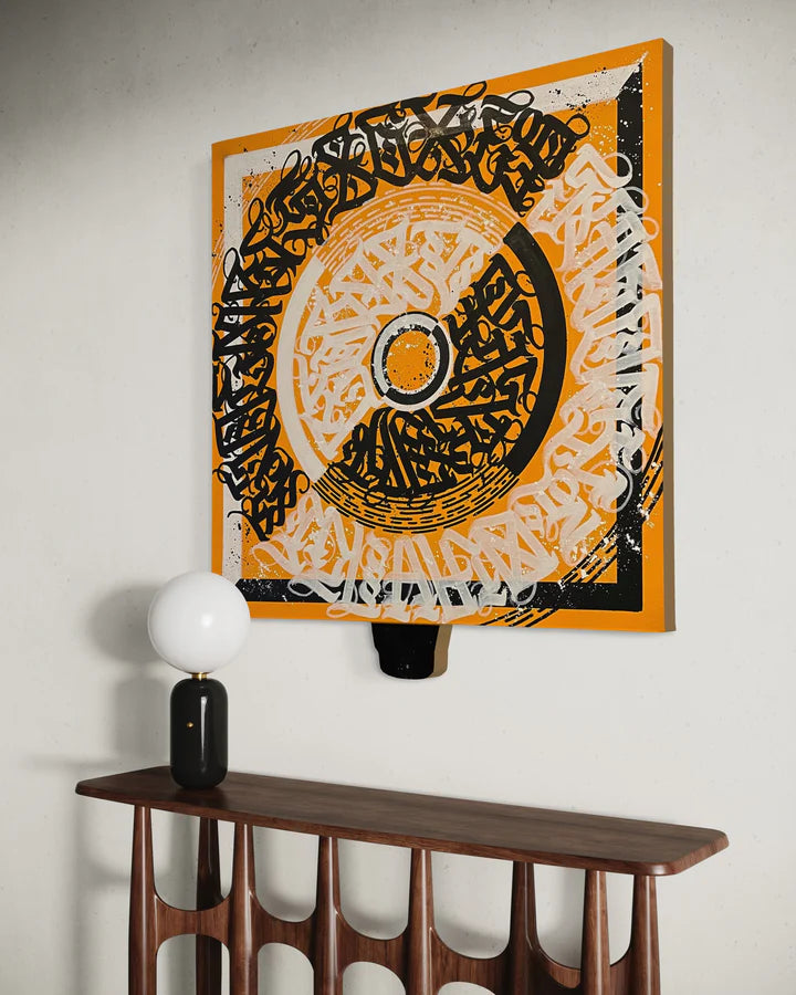 CIRCLES OF EXPRESSION YELLOW artwork mounted on a wall – showcasing the bold circular motif and vibrant contrast of color in a modern space.