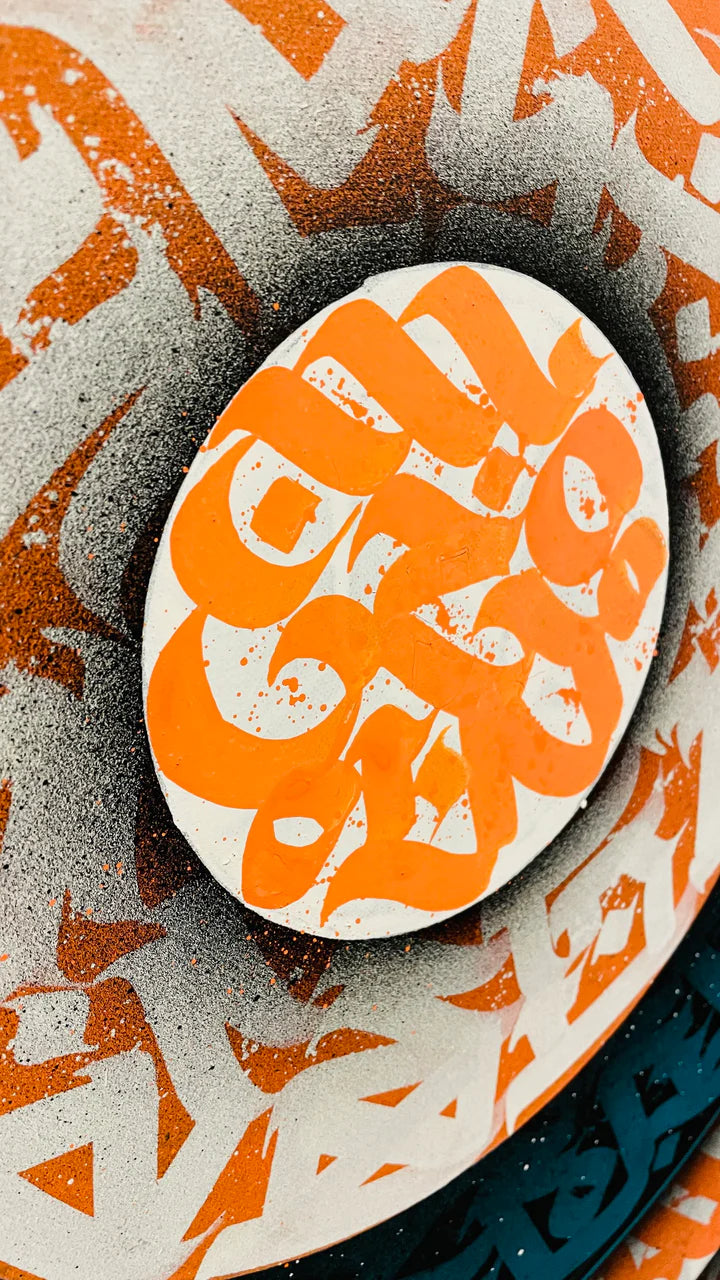 Close-up center view of “ETERNAL HARMONY” – focusing on the intricate details of the intertwined turquoise and orange calligraphic strokes.