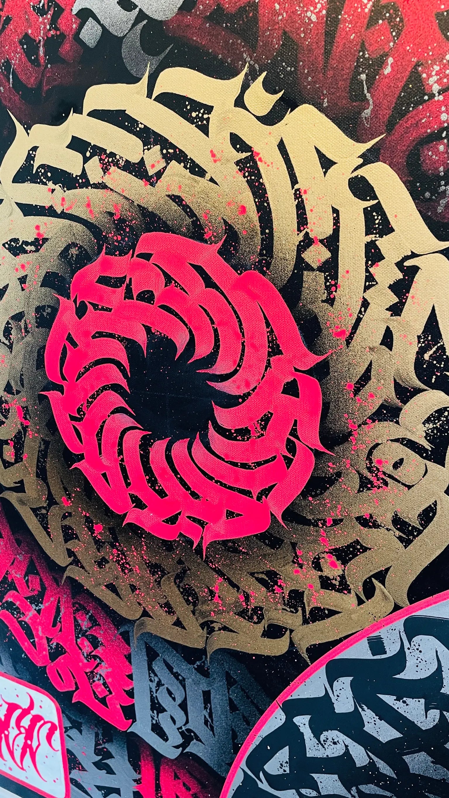 Close-up detail of THE AKIRA by Burnzy Art – swirling red calligraphy strokes forming a mesmerizing vortex at the center of the canvas.