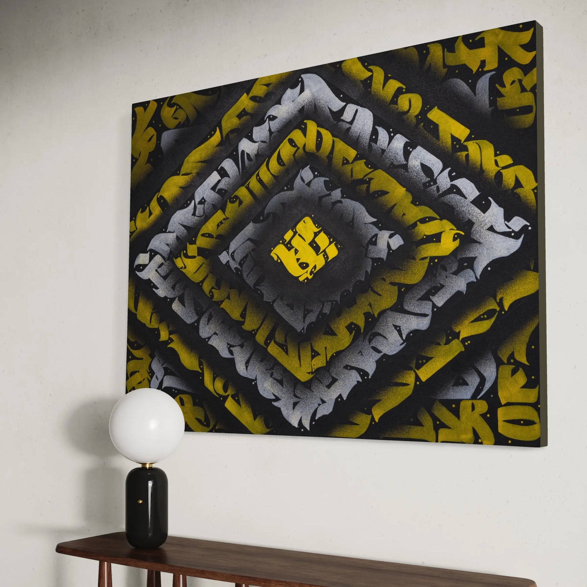 Side view of THE KILLER BEE mounted on a wall – showcasing the artwork’s vibrant contrast, angular calligraphy, and canvas texture.