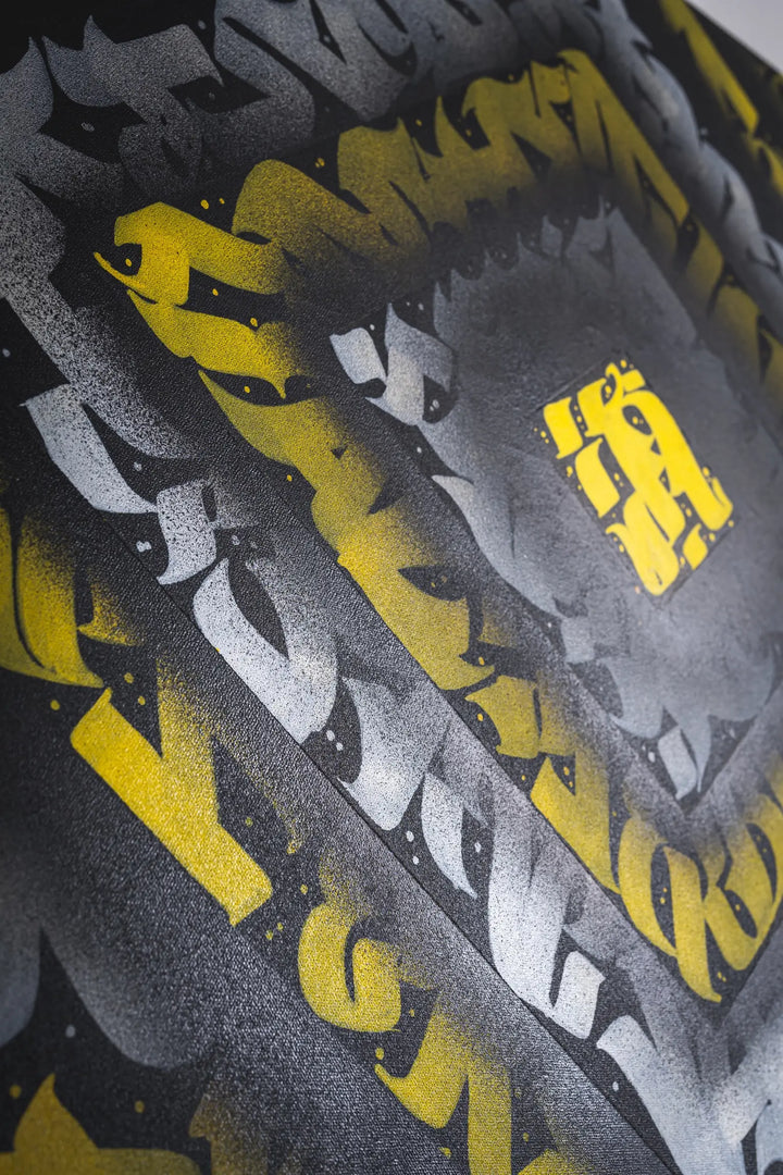 Second zoomed-in angle of THE KILLER BEE from the left – capturing layered calligraphic strokes and depth from overlapping color blocks.