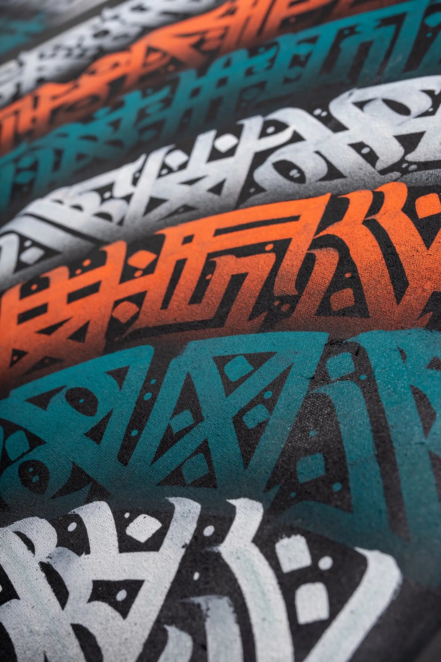 Second zoom angle of THE PIN WHEEL – showcasing the rhythmic pattern and energetic symmetry of the calligraphy flow.