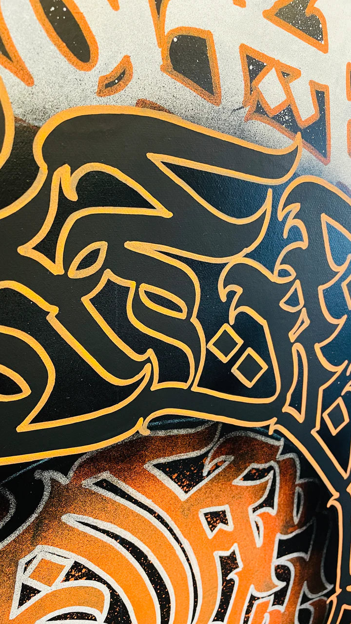 Top angle view of “VOLCANIC VERSES,” highlighting the layered brush strokes and the glowing orange-black contrast.