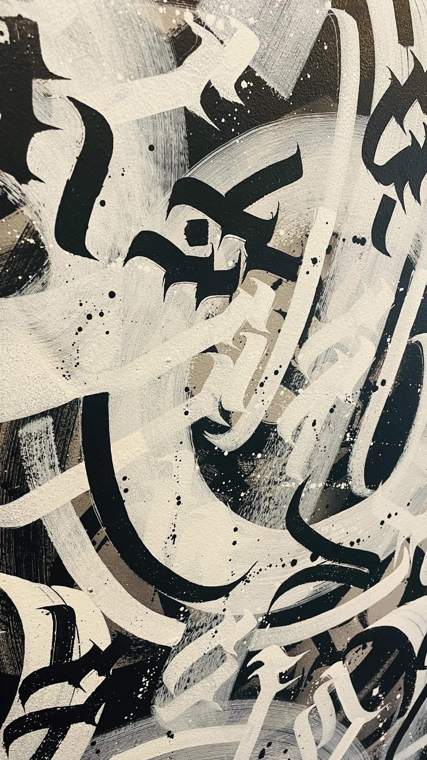 Side profile showing depth and box canvas edges of Chaos calligraffiti artwork.