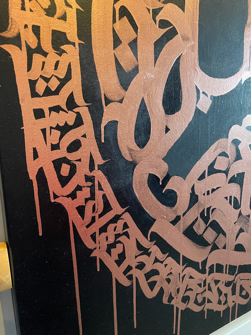 Close-up of original brush calligraphy and paint texture on A Bad Trip